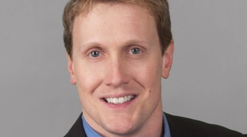 Johh Lemley worked at WABE in different capacities for 18 years but is now bound for WMLB. CREDIT: WABE, 2010