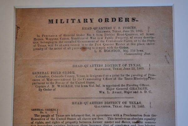 A view of a section of the 1865 Juneteenth General Order No. 3 that is displayed by the Dallas Historical Society at the Fair Park Hall of State in Dallas, Friday, June 6, 2025. (AP Photo/LM Otero)