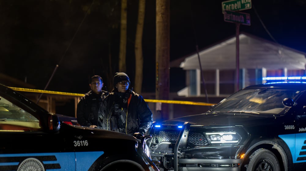 Atlanta police investigate a fatal shooting on Cornell Boulevard early Monday. (Ben Hendren for the AJC)