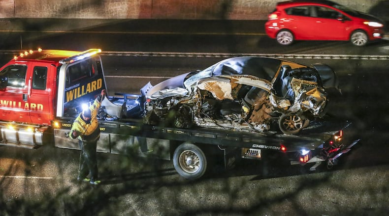 Gwinnett County police investigated a deadly wrong-way crash on I-85 south near Jimmy Carter Boulevard that shut down the interstate for hours on Jan. 20. JOHN SPINK /JSPINK@AJC.COM