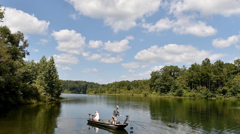 Fisherman on the Cedar Creek Reservoir. Backers of the proposed Glades Reservoir, which would be located north of the current Cedar Creek Reservoir, have argued population growth in the region would make the project necessary. However, new population projections show the area growing much slower than anticipated. BRANT SANDERLIN/BSANDERLIN@AJC.COM