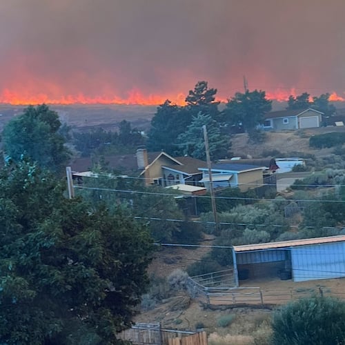 This image provided by Cari Kieffer shows part of the Hawk fire in Reno, Nev. (Cari Kieffer via AP)
