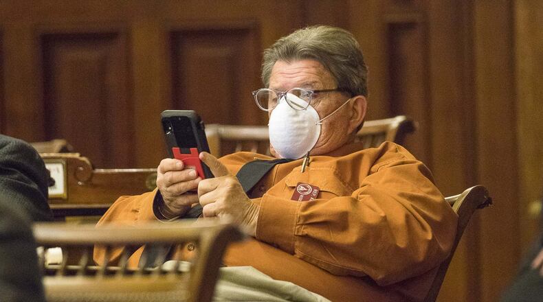 Georgia Rep. Alan Powell, R-Hartwell, wears a protective mask during a special session at the Georgia Capitol in March. (ALYSSA POINTER/ALYSSA.POINTER@AJC.COM)