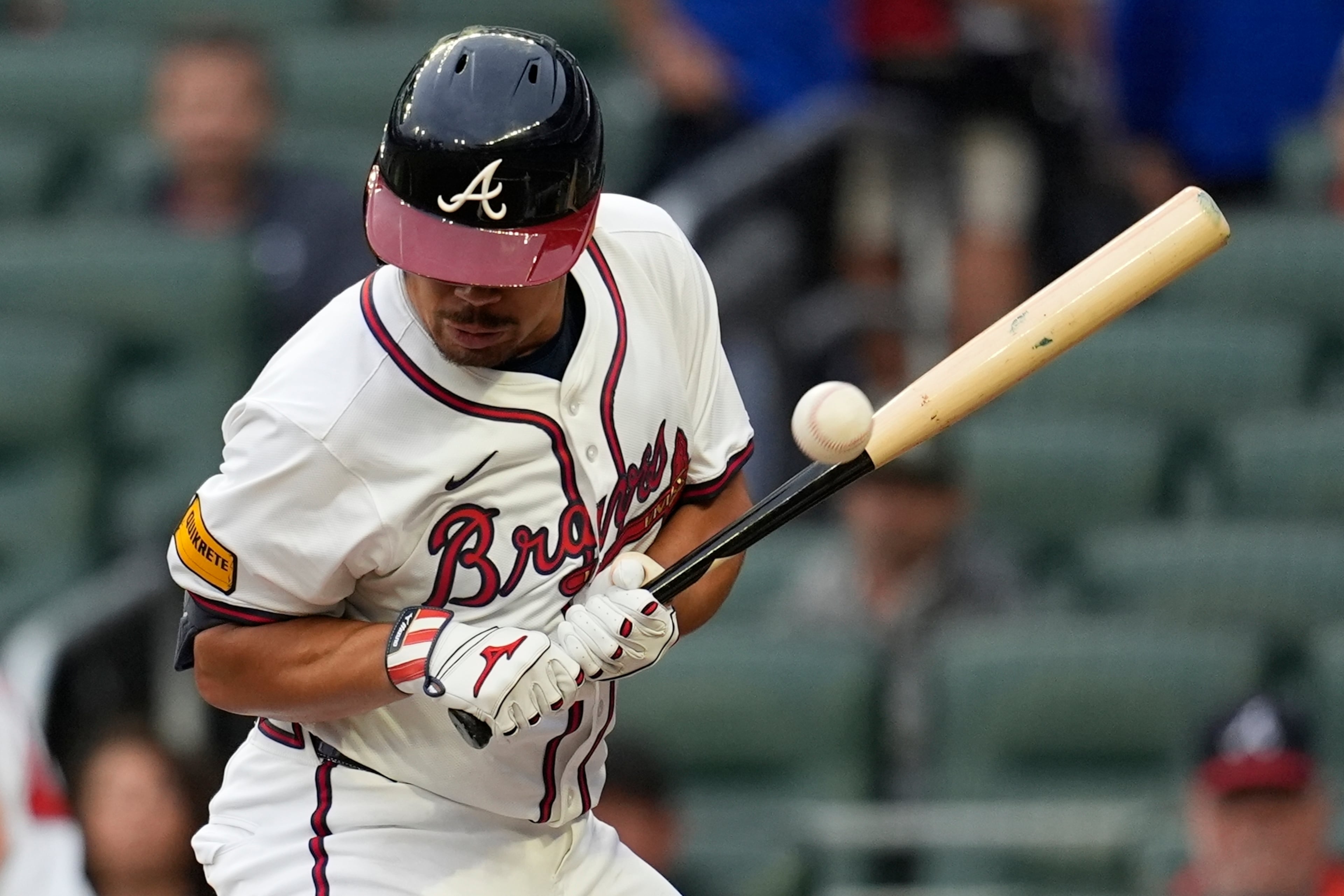 The Brewers' Quinn Priester hit Braves catcher Drake Baldwin with a pitch in the first inning Monday.