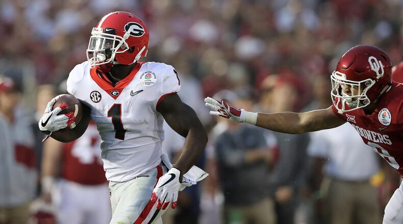 January 1, 2018 Pasadena: Georgia tailback Sony Michel breaks free for a touchdown against Oklahoma during the second half in the College Football Playoff Semifinal at the Rose Bowl Game on Monday, January 1, 2018, in Pasadena.    Curtis Compton/ccompton@ajc.com