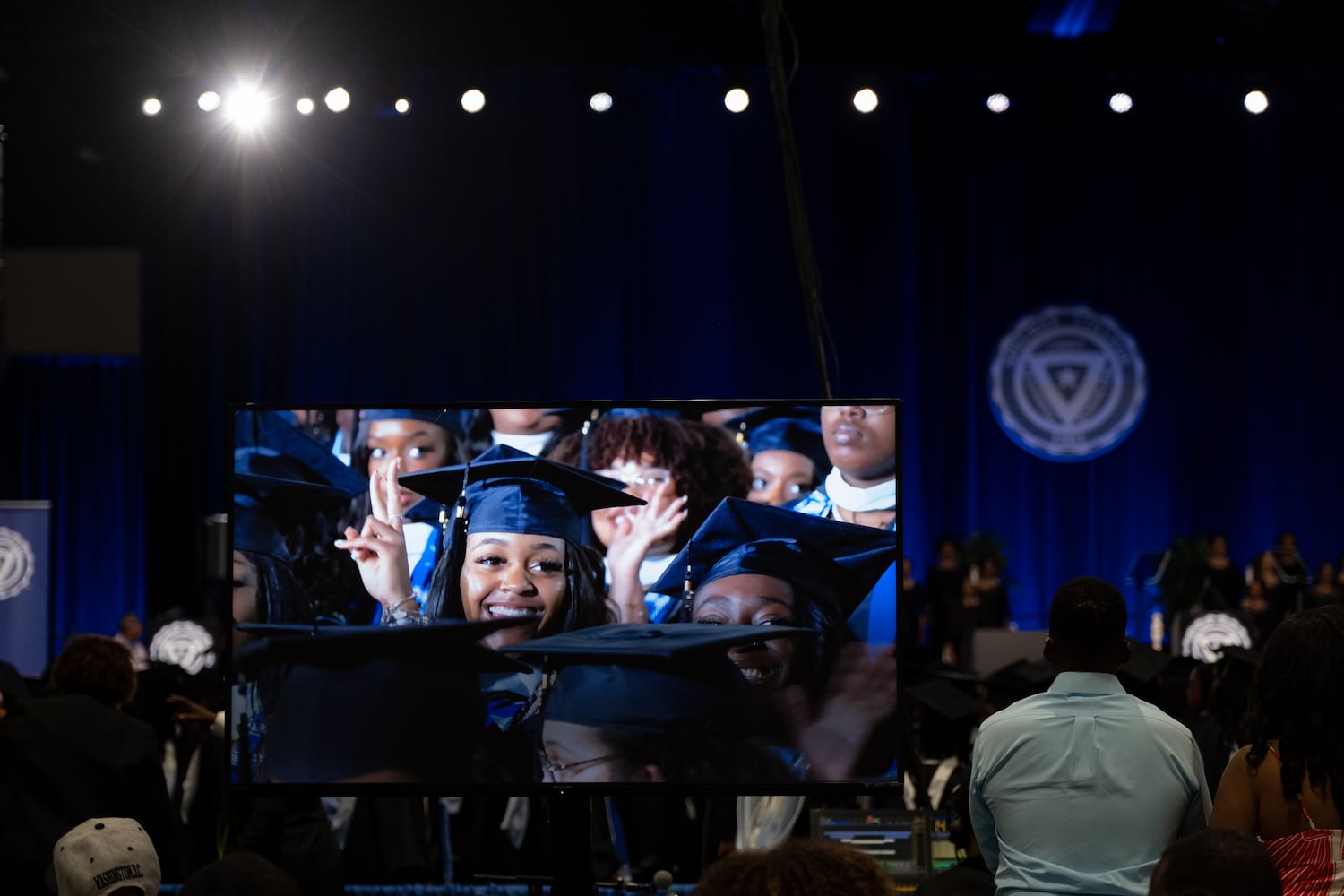 Students cheer at the start of the Spelman College graduation ceremony at the Georgia International Convention Center in College Park on Sunday, May 18, 2025.   Ben Gray for the Atlanta Journal-Constitution