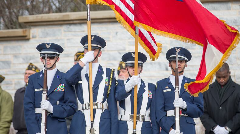 11/12/2019 -- Canton, Georgia -- Members of the Air Force R.O.T.C. program at Sequoyah High School post the colors during a veterans internment ceremony provided by the Dignity Memorial Program at the Georgia National Cemetery in Canton, Tuesday, November 12, 2019. The Dignity Memorial program honors the lives of homeless or indigent United States veterans whose remains are not claimed. Tuesday's funeral honored the lives of seven United States World War II veterans. (Alyssa Pointer/Atlanta Journal Constitution)