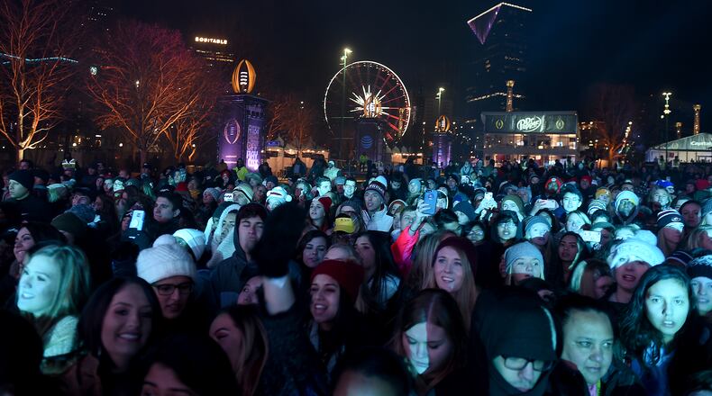 A small, but excited crowd braved the cold for the AT&T Playoff Playlist Live! concerts Saturday night at Centennial Olympic Park. Photo: Ryon Horne/AJC