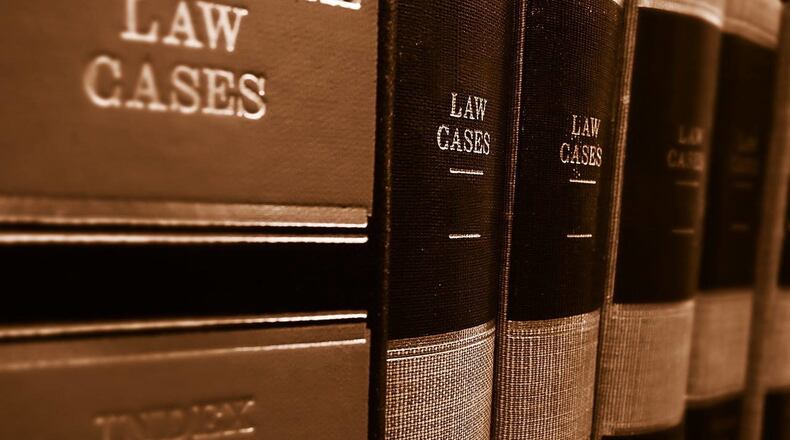 A Texas woman filed a lawsuit after she said she mistook a floor-to-glass window for an open doorway at a suburban Houston grocery store.