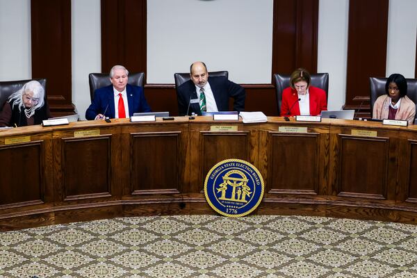 Board members listen during a State Election Board meeting at Barrow County Historic Courthouse in Winder, on Wednesday, Feb. 18, 2026. (Abbey Cutrer/AJC)