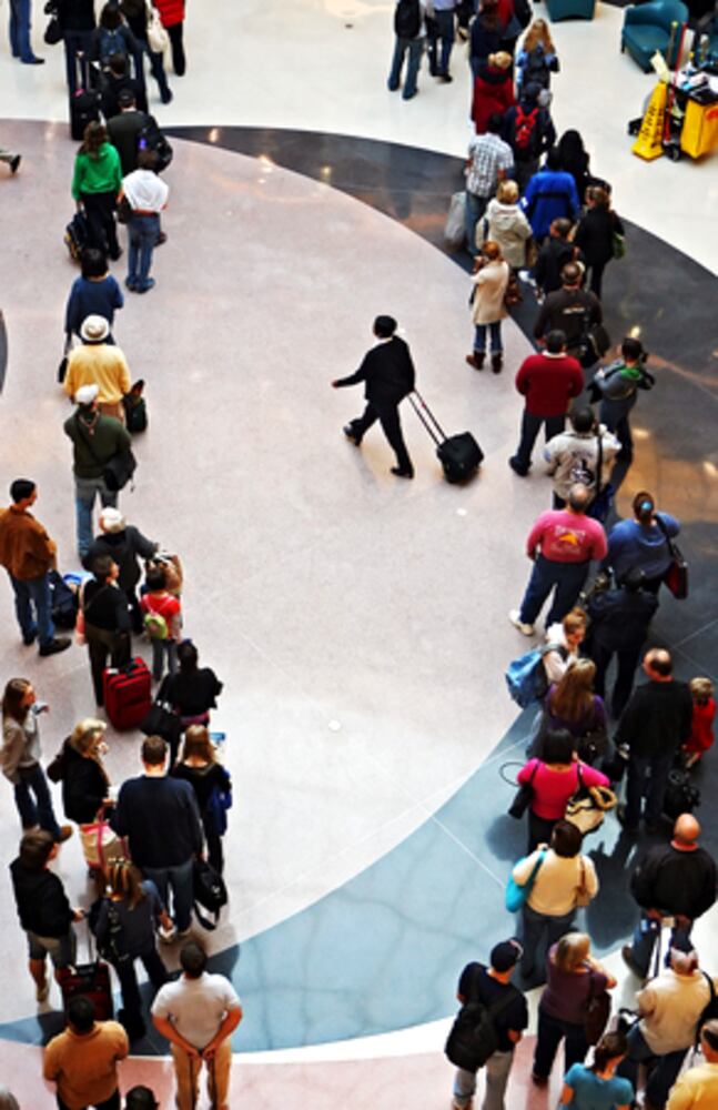 It's busy everywhere: Scenes from the nation's airports