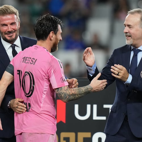 Inter Miami co-owners David Beckham, left, and Jose Mas, right, celebrate with Lionel Messi (10) after Inter Miami defeated Cruz Azul in the Campeones Cup soccer match, Wednesday, Sept. 16, 2026, in Miami. (AP Photo/Lynne Sladky)
