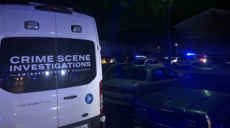 The man was found dead between two apartment buildings, officials said.