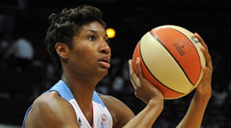 May 30, 2014 Atlanta: Atlanta Dream's Angel McCoughtry shoots against Seattle Storm at Phillips Arena Friday May 31, 2014. BRANT SANDERLIN /BSANDERLIN@AJC.COM . The only kind of shot I want to experience at Philips Arena. (BRANT SANDERLIN /BSANDERLIN@AJC.COM)