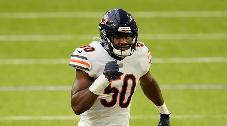 Barkevious Mingo runs down the field while playing for the Chicago Bears.  (AP Photo/Jim Mone)
