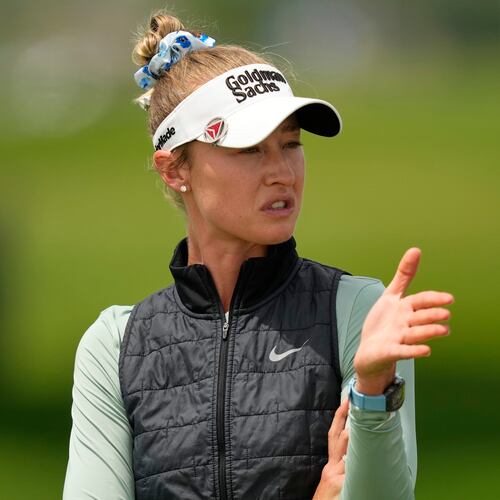 Nelly Korda talks to her caddie on the first hole during the final round of the Women's PGA Championship golf tournament at Hazeltine National Golf Club, Sunday, June 28, 2026, in Chaska, Minn. (AP Photo/Matt York)