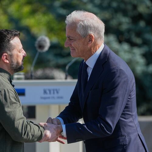 FILE - Ukraine's President Volodymyr Zelenskyy greets Norway's Prime Minister Jonas Gahr Stoere ahead of the flag-raising ceremony to mark the National Flag Day in Kyiv, Ukraine, on Aug. 23, 2026. (AP Photo/Efrem Lukatsky, File)