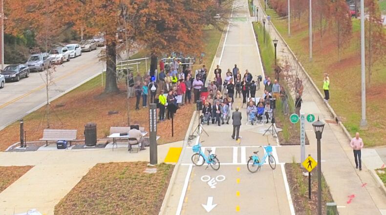 The City of Atlanta and Dr. G.P. ‘Bud’ Peterson celebrated the Grand Opening of PATH Parkway at Georgia Tech on Tuesday, Dec. 5. PATH Parkway is a tree-lined walking and biking facility connecting West Midtown, Georgia Tech and the Coca-Cola headquarters to Centennial Olympic Park. CONTRIBUTED