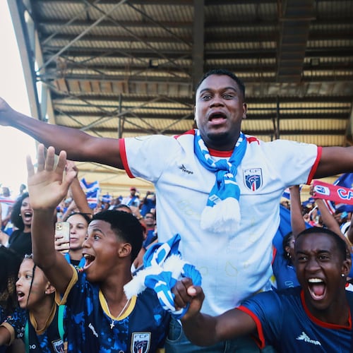 Fans celebrate in the stands after Cape Verde defeated Eswatini in a World Cup qualifying soccer match at Estádio Nacional in Praia, Cape Verde, Monday, Oct. 13, 2025, to clinch their qualification for the 2026 World Cup. (Cristiano Barbosa/AP)