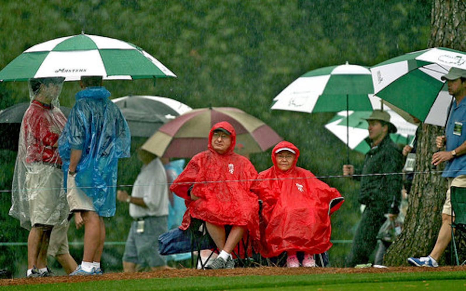 Umbrellas fill Augusta National