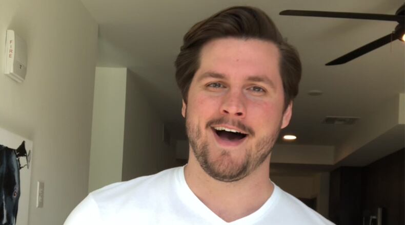 Jonathan Bryan, baritone, and member of the Atlanta Opera Studio Artists, records a "singing telegram." The opera is sending these pre-recorded serenades to help cheer up health care workers and shut-ins. CONTRIBUTED: ATLANTA OPERA