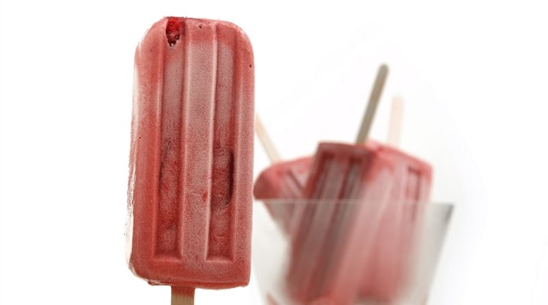 Strawberries, both fresh and freeze-dried, create the flavor base for these frozen pops. Coconut milk provide some richness and body.(E. Jason Wambsgans/Chicago Tribune/TNS)