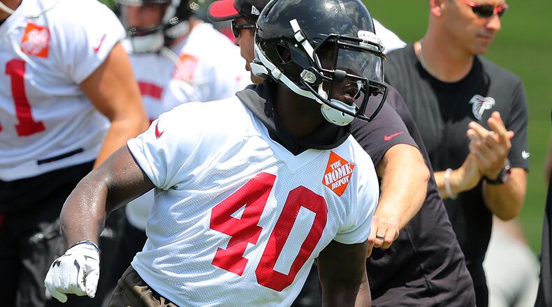 June 13, 2017, Flowery Branch: Falcons tight end Eric Saubert (left) and fullback Derrick Coleman run a agility drill during the first day of mini-camp on Tuesday, June 13, 2017, in Flowery Branch. Curtis Compton/ccompton@ajc.com