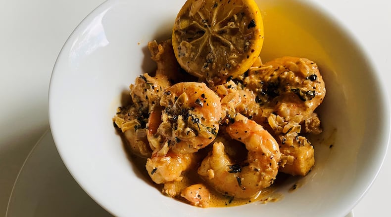 Serpas True Food Big Easy BBQ Shrimp with rosemary focaccia bread. 
Bob Townsend for The Atlanta Journal-Constitution