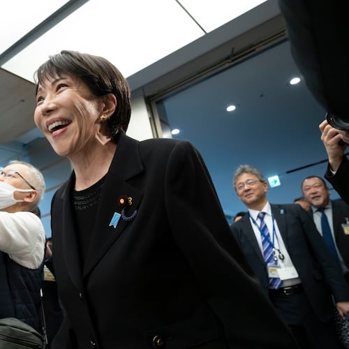 Japan's Prime Minister Sanae Takaichi, arrives for a meeting with members of British rock band Deep Purple at the Prime Minister's Office in Tokyo, Friday, April 10, 2026. (Yuichi Yamazaki/Pool Photo via AP)