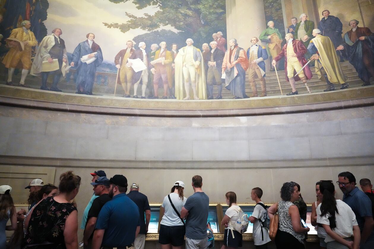 People wait to look at the original Declaration of Independence and U.S. Constitution at the National Archives Museum, Friday, July 3, 2026, in Washington. (Julia Demaree Nikhinson/AP)