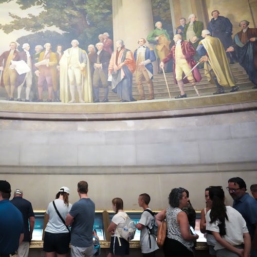 People wait to look at the original Declaration of Independence and U.S. Constitution at the National Archives Museum, Friday, July 3, 2026, in Washington. (Julia Demaree Nikhinson/AP)
