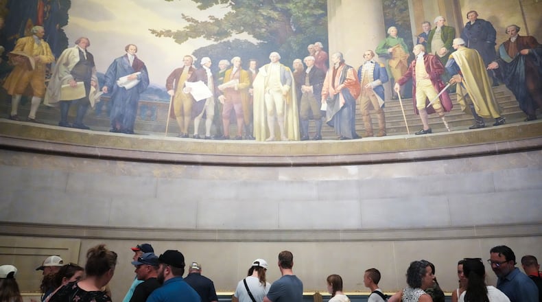 People wait to look at the original Declaration of Independence and U.S. Constitution at the National Archives Museum, Friday, July 3, 2026, in Washington. (Julia Demaree Nikhinson/AP)