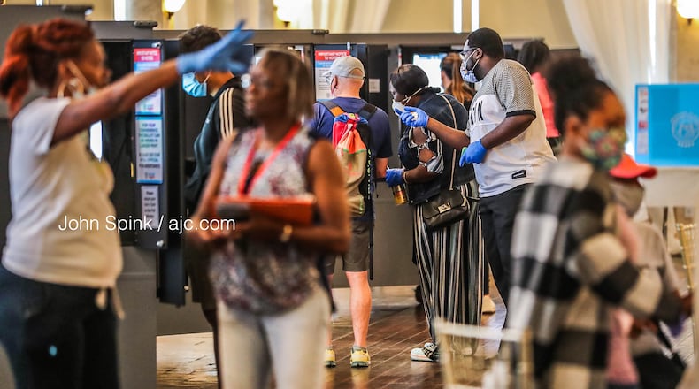 Voters waited in very long lines at Park Tavern at Piedmont Park in Midtown Atlanta on election day on Tuesday, June 9, 2020. JOHN SPINK / JOHN.SPINK@AJC.COM