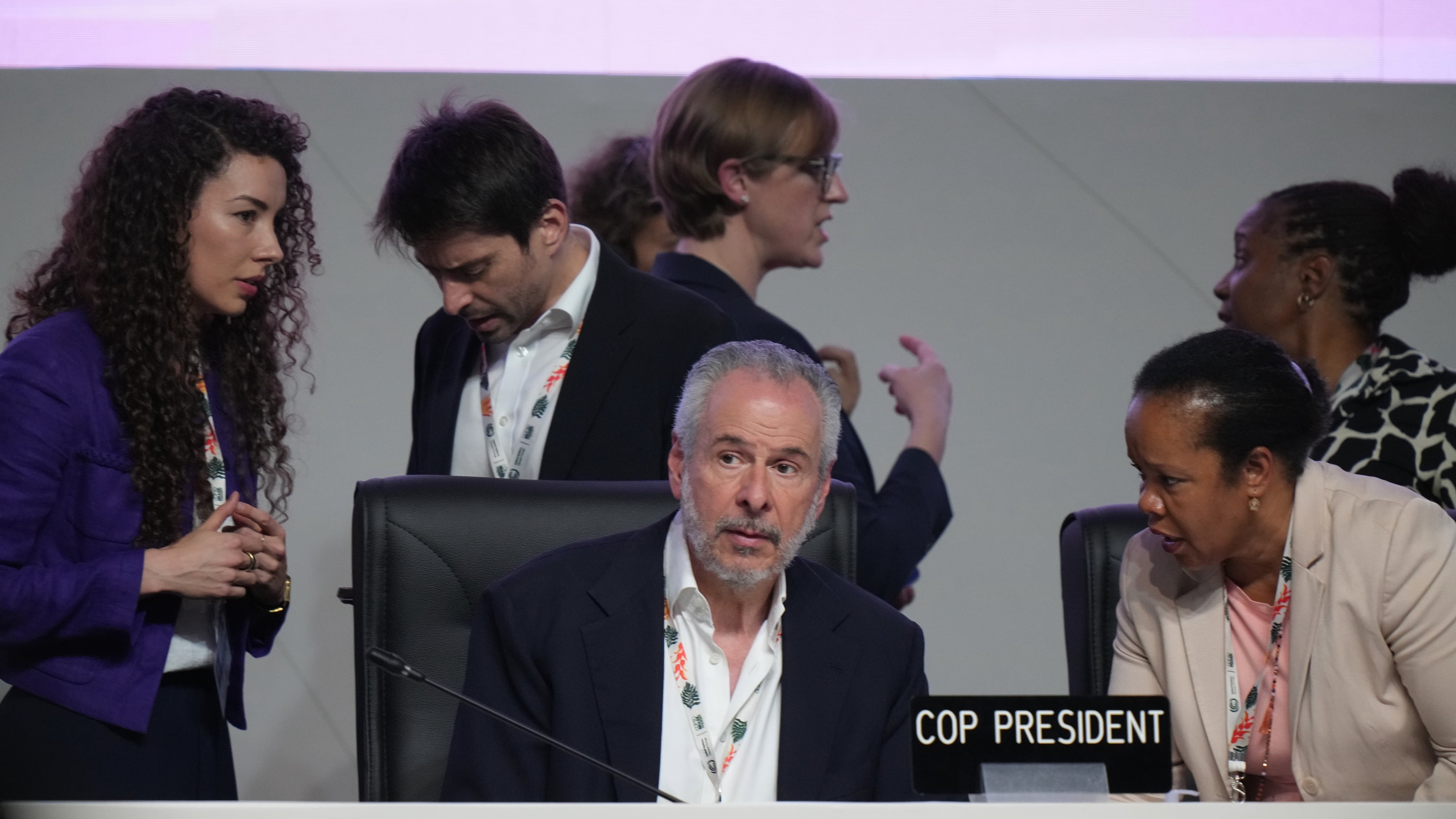 André Corrêa do Lago, COP30 president, center, arrives for a plenary session at the COP30 U.N. Climate Summit, Saturday, Nov. 22, 2025, in Belem, Brazil. (AP Photo/Fernando Llano)