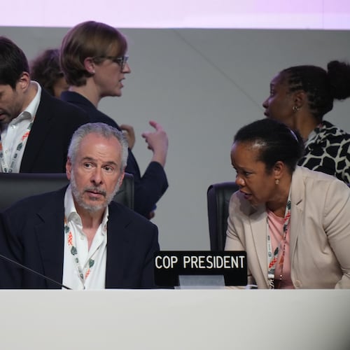 André Corrêa do Lago, COP30 president, center, arrives for a plenary session at the COP30 U.N. Climate Summit, Saturday, Nov. 22, 2025, in Belem, Brazil. (AP Photo/Fernando Llano)
