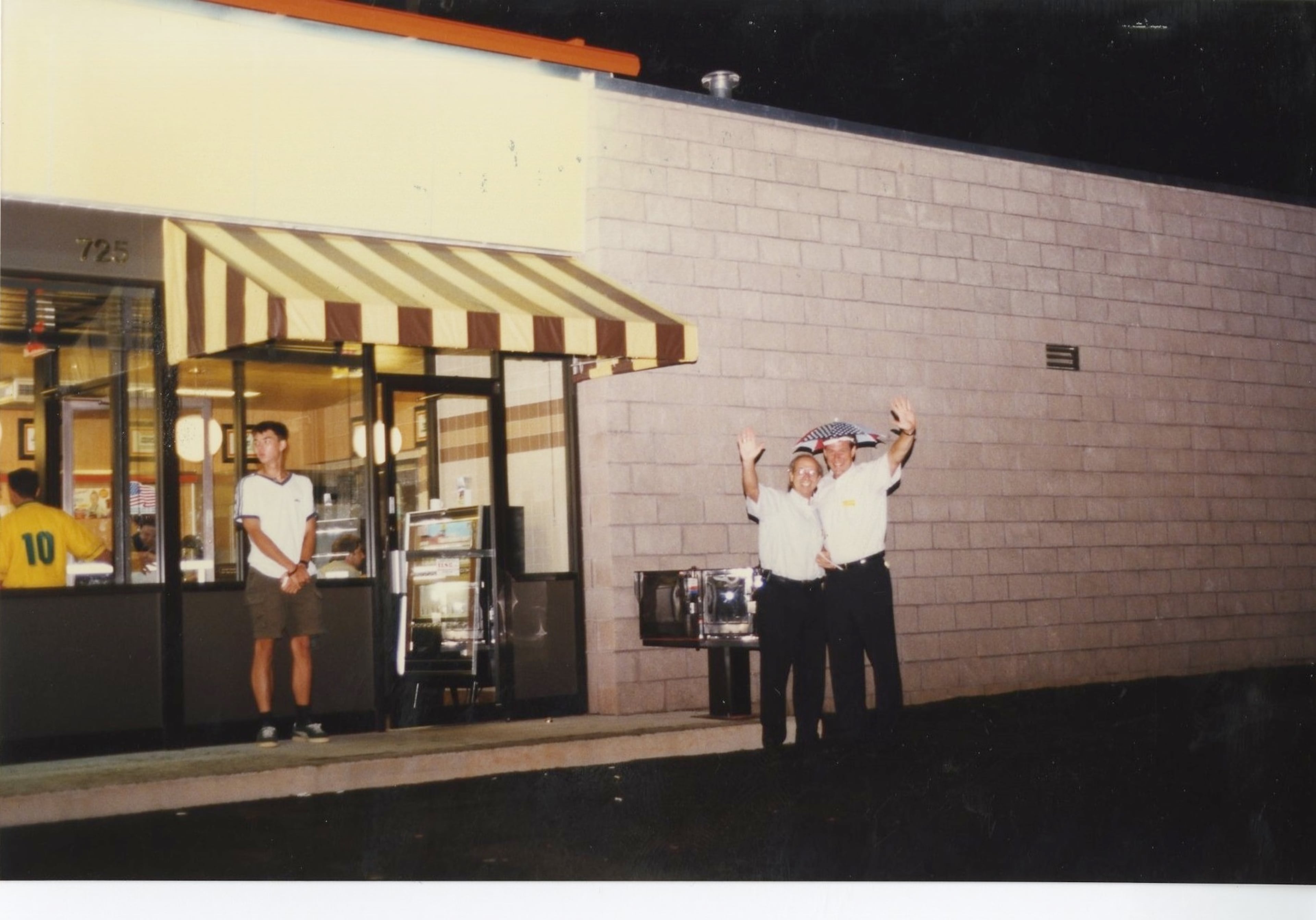 1996: Employees stand outside a new Waffle House built for the 1996 Summer Olympics, which were held in Atlanta.