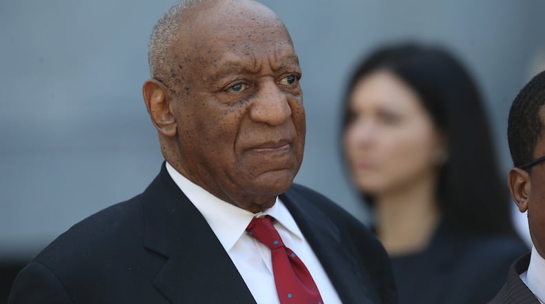 Bill Cosby walks out of the Montgomery County Courthouse in Norristown, Pa., on Thursday after learning a jury found him guilty of sexual assault. Cosby’s tarnished image has fans of “The Cosby Show” debating whether to still watch the show in reruns. DAVID SWANSON / PHILADELPHIA INQUIRER / TNS