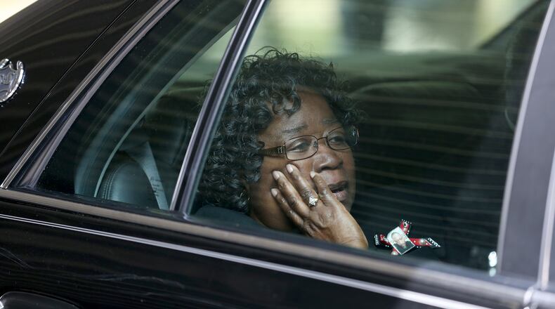 SUMMERVILLE, SC - APRIL 11: Judy Scott sits in a vehicle after the funeral for her son Walter Scott, at the W.O.R.D. Ministries Christian Center, after he was fatally shot by a North Charleston police officer after fleeing a traffic stop in North Charleston on April 11, 2015 in Summerville, South Carolina. Mr. Scott was killed on April 4 by North Charleston police officer Michael T. Slager after a traffic stop. The officer now faces murder charges. (Photo by Joe Raedle/Getty Images)