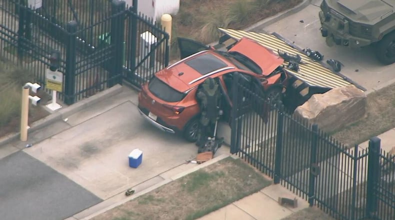 An SUV driven by Ervin Lee Bolling rammed into the gate of an FBI office on Flowers Road in Chamblee on April 1, 2024. Just over a year later, Bolling pleaded guilty.