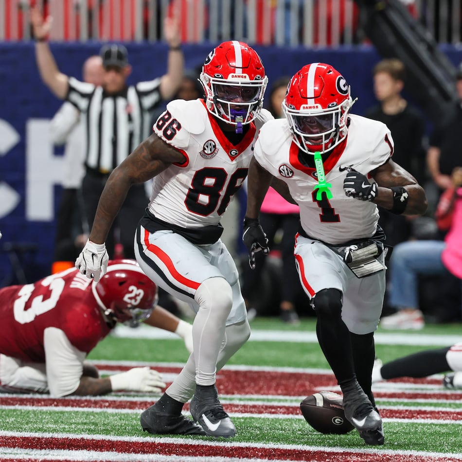 Georgia wide receiver Zachariah Branch (center), shown celebrating after scoring a touchdown against Alabama during the SEC championship game, was nabbed by the Atlanta Falcons with the No. 79 overall pick in the draft. (Jason Getz/AJC 2025)