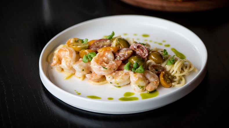 Tre Vele restaurant in Atlanta offers spaghetti with shrimp, white wine, and tomatoes. (Mia Yakel for The Atlanta Journal-Constitution)