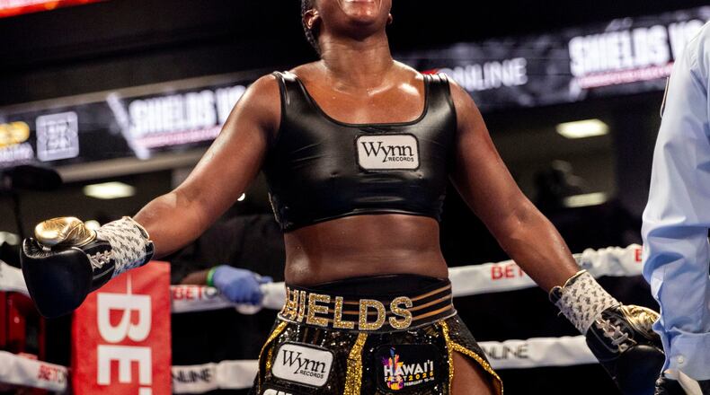 FILE - Claressa Shields captures the undisputed heavyweight title with a unanimous decision victory over Danielle Perkins on Feb. 2, 2025, at Dort Financial Center in Flint, Mi. (Jake May/The Flint Journal via AP, File)