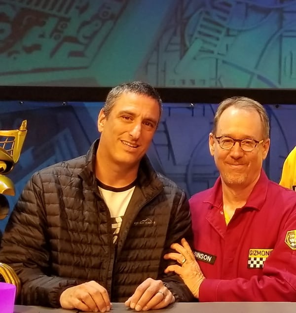 Larry Johnson (left) met Joel Hodgson when Hodgson did a "Mystery Science Theatre 3000 Live" show at Atlanta Symphony Hall in 2018. Johnson, a restaurateur with a yen for comedy, says Cineprov started partly by accident. (Courtesy)