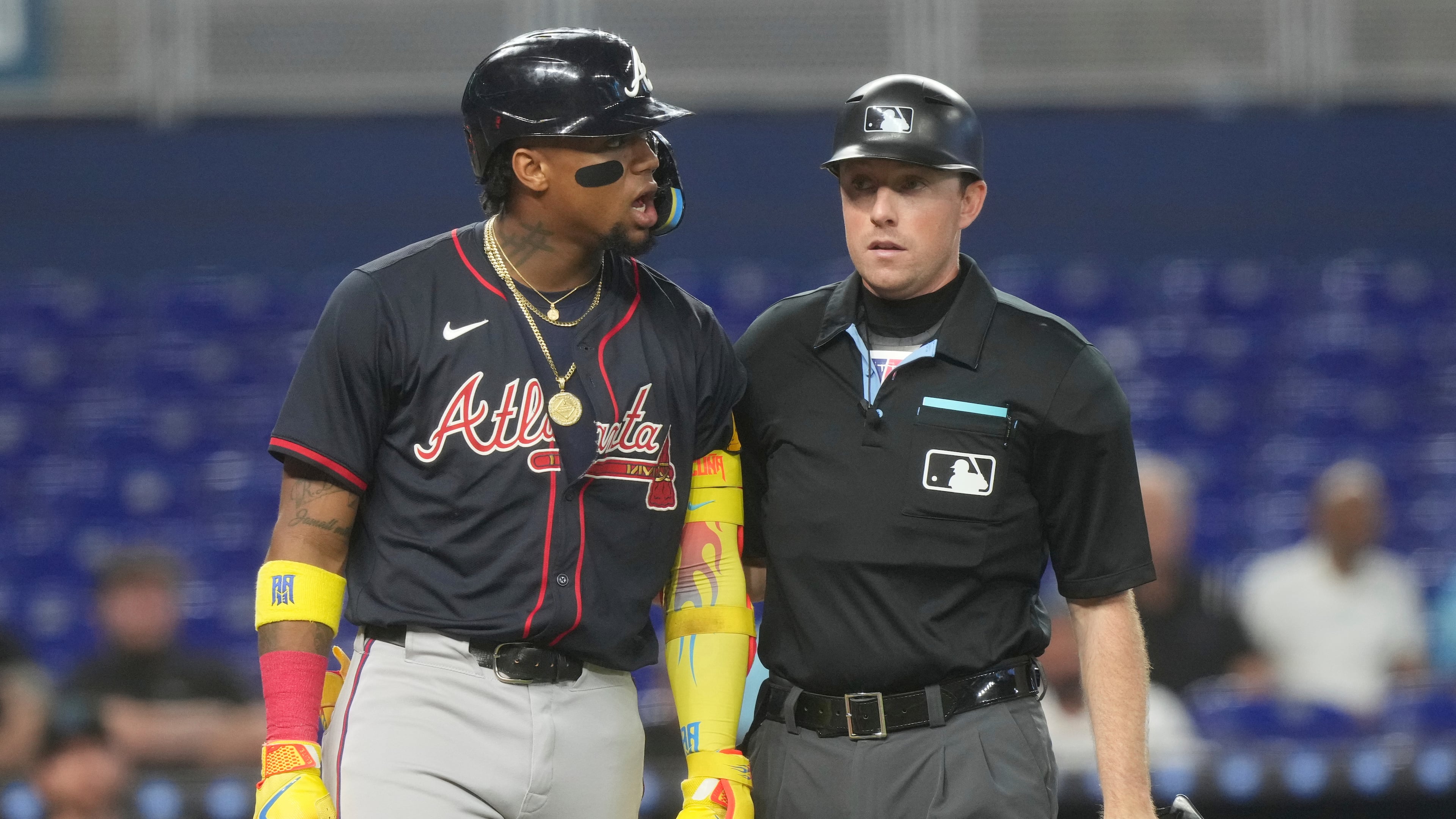 Atlanta Braves' Ronald Acuña Jr. yells to Miami Marlins pitcher Ryan Gusto after he was hit by a pitch during the third inning of a baseball game, Wednesday, Aug. 27, 2025, in Miami. (Marta Lavandier/AP)