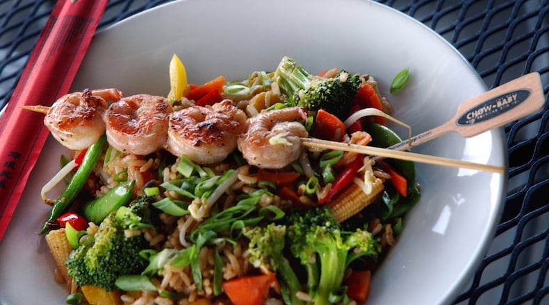 Stir fry veggies and shrimp over rice at Real Chow Baby. / AJC file photo