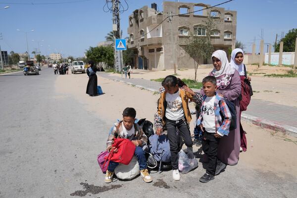 Displaced Palestinians, who flee from Rafah, arrive in Khan Younis, Gaza, on Monday, March 31, 2025, after the Israeli military issued sweeping evacuation orders covering most of Rafah. (AP Photo/Abdel Kareem Hana)