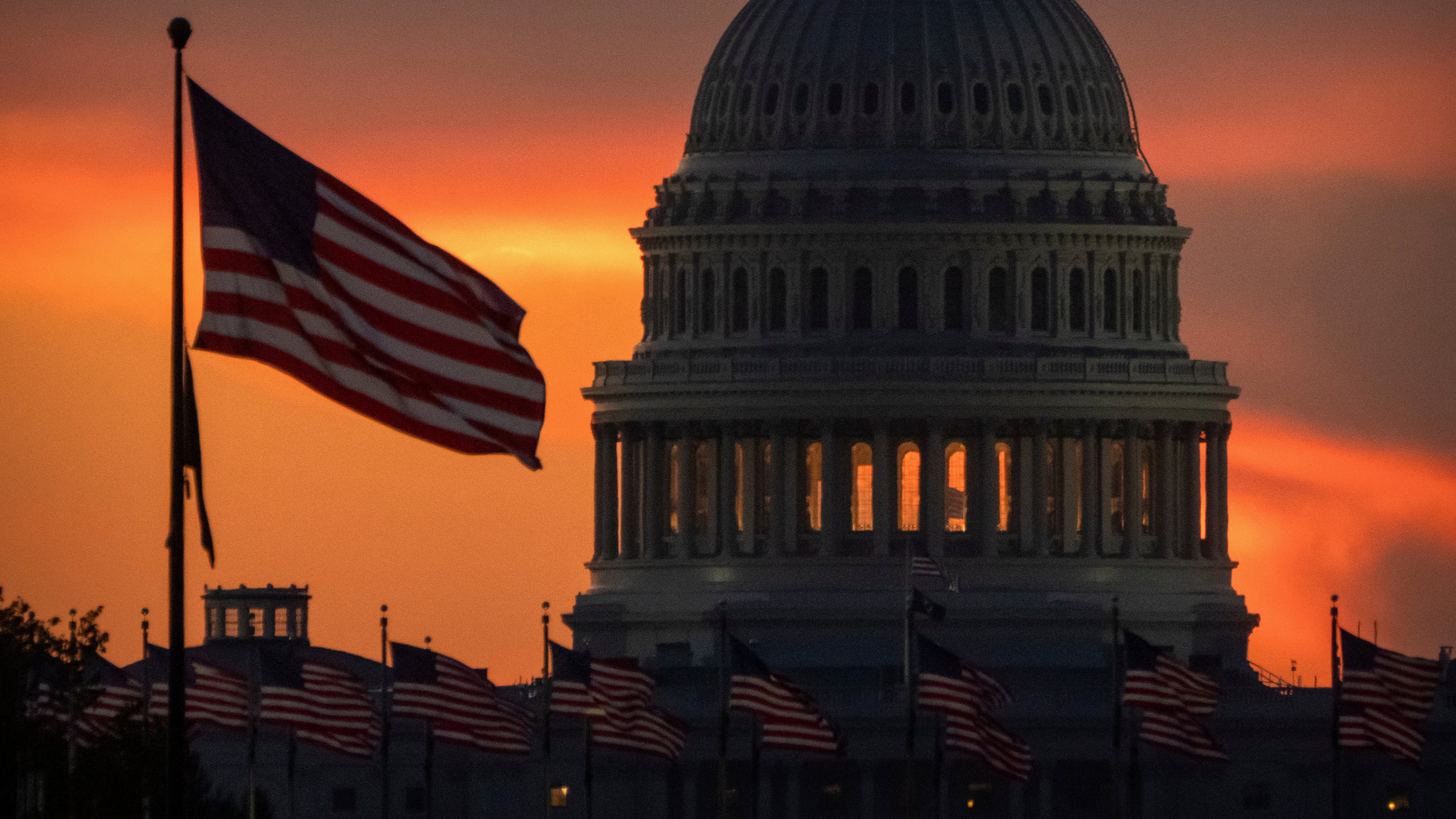 The dome of the U.S. Capitol is seen at sunrise on Wednesday, Oct. 1, 2025, in Washington. (AP Photo/Mark Schiefelbein)