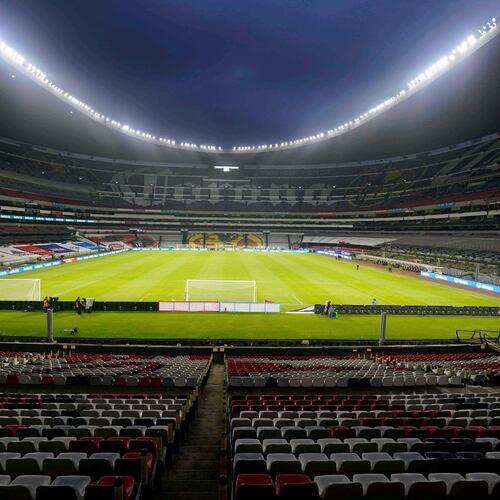 FILE - The stands of the Azteca stadium are seen empty of fans prior a World Cup Qatar 2022 qualifying soccer match between Mexico and Jamaica, in Mexico City, Thursday, Sept. 2, 2021. (AP Photo/Eduardo Verdugo, File)