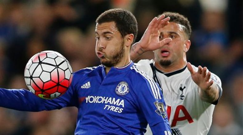 Chelsea's Eden Hazard, left, vies for the ball with Tottenham's Kyle Walker during the English Premier League soccer match between Chelsea and Tottenham Hotspur at Stamford Bridge stadium in London, Monday, May 2, 2016. (AP Photo/Frank Augstein)