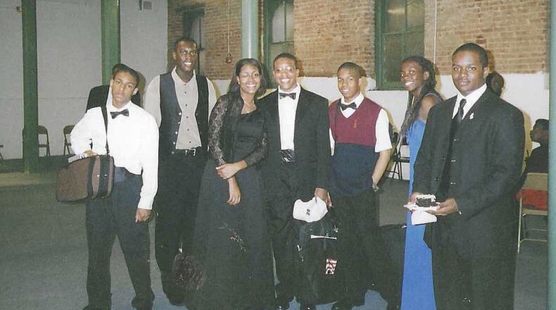 Participants in the Atlanta Symphony Orchestra's Talent Development Program gather backstage after a recital in 2002. Tara Byrdsong (third from left) said, “It was fun to be around students who were like-minded and who looked like me." (Courtesy of Tyra Byrdsong)
